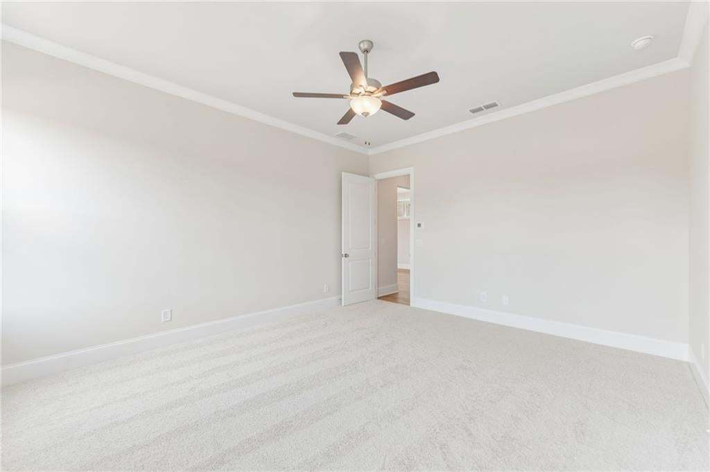 Spacious primary bedroom. Come see this move-in ready home while it lasts!!