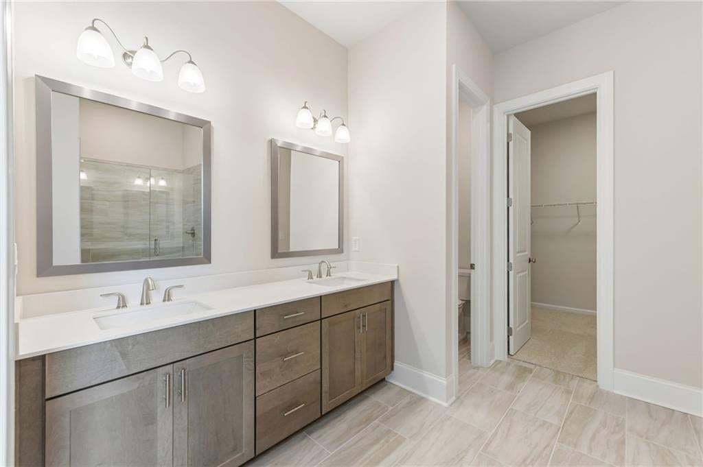 Tons of storage in the primary bathroom! Double vanities, water closet and great primary closet space.