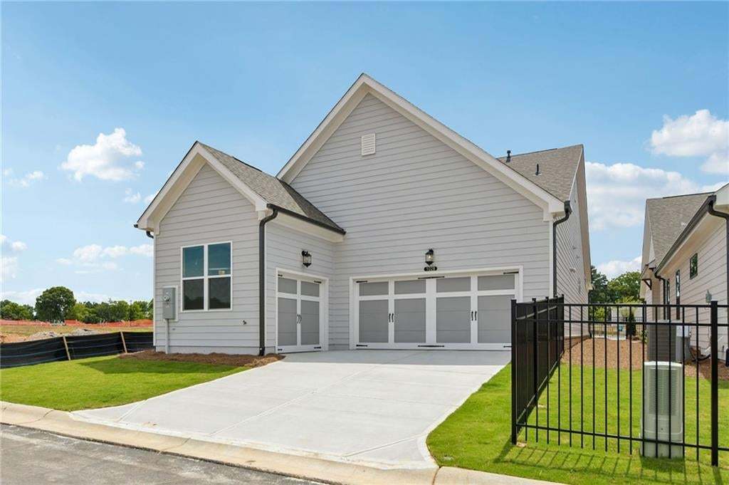 Ample parking space in driveway.  All yards are fenced and lawns maintained by HOA.