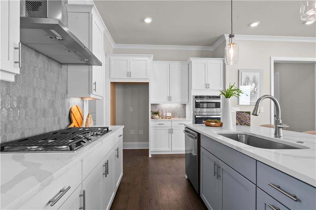 Soft touch drawers and doors throughout the home.  GE stainless steel appliances.