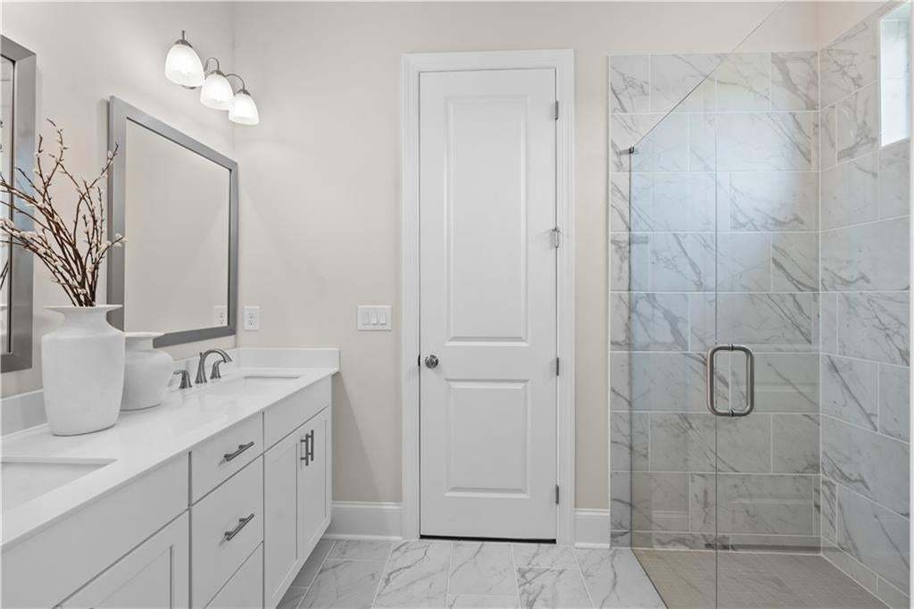 Dual vanity with rectangular sinks and chrome faucets