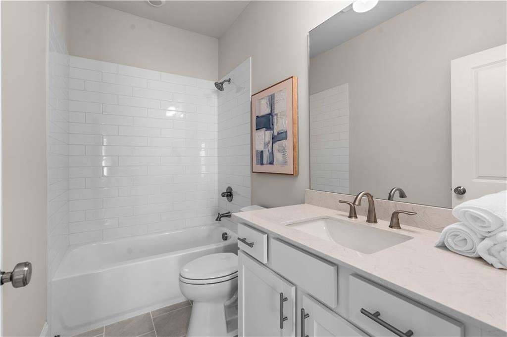 Upstairs bathroom with soft touch drawers and doors.