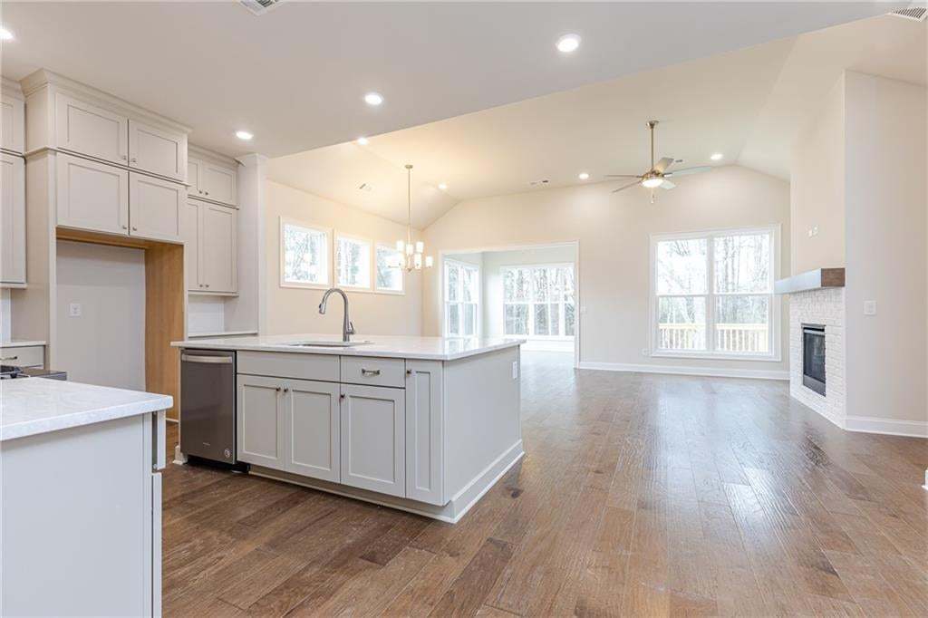 Open-concept living. Kitchen, Family room and sunroom. Perfect for a Saturday afternoon with friends and family.