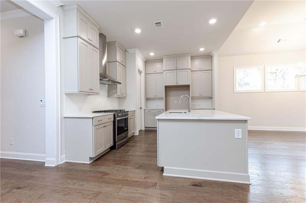 Quartz countertops in kitchen.