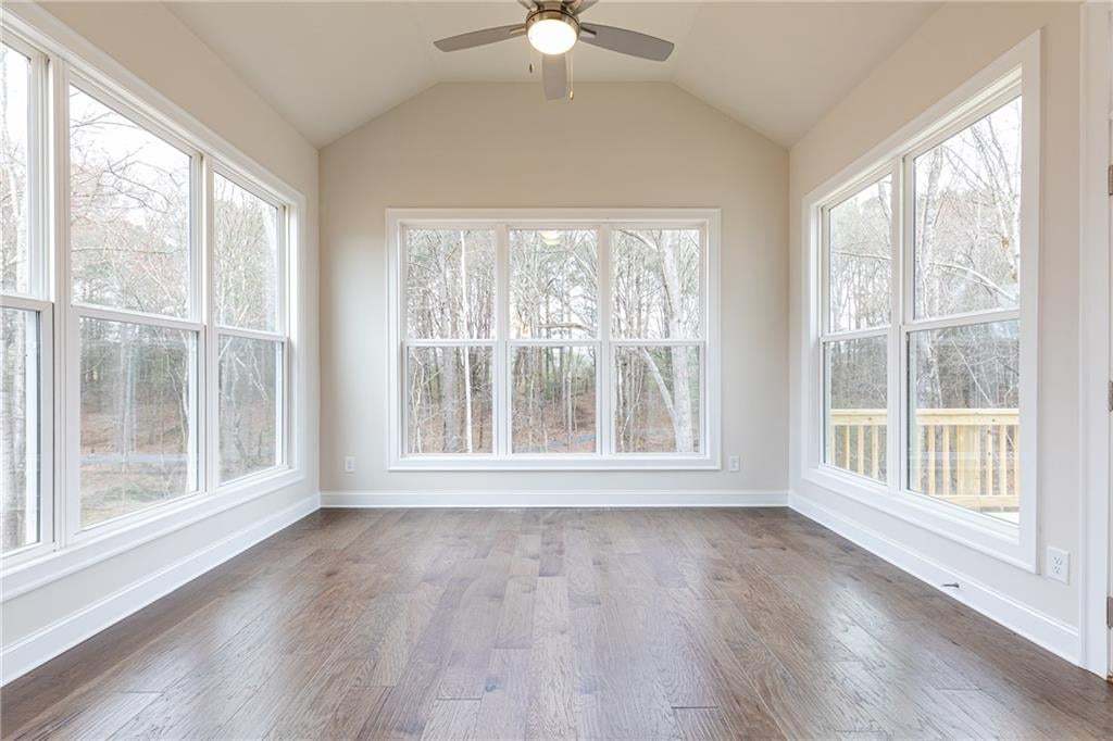 Best seat in the house!- the Sun Room! Wall to Wall windows.
