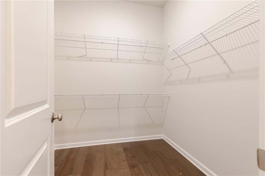 off of the loft is a storage closets with racks