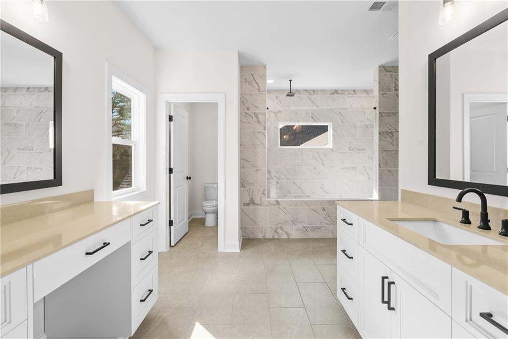 This is it! Separate vanities plus a makeup area.