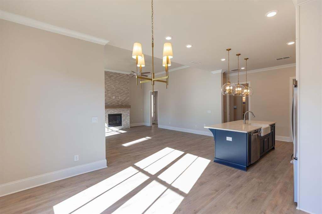 Open concept living..you will love the natural light that flows easily through this home.  Photo is for representation purposes only, not of actual home but a previously built home by The Providence group.