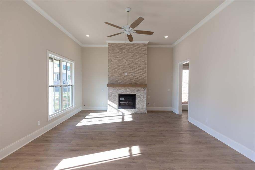 This home will feature 4 bedrooms, 3.5 baths, upgraded black exterior windows; fireplace, quartz countertops, ambient under cabinet lighting.  So much to see!!  Photo is for representation purposes only, not of actual home but a previously built home by