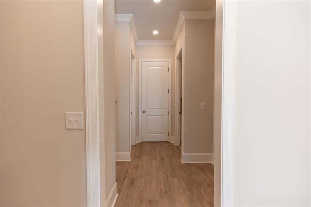 Rear entry garage, making the street scape look prestine.   Photo is for representation purposes only, not of actual home but a previously built home by The Providence group.
