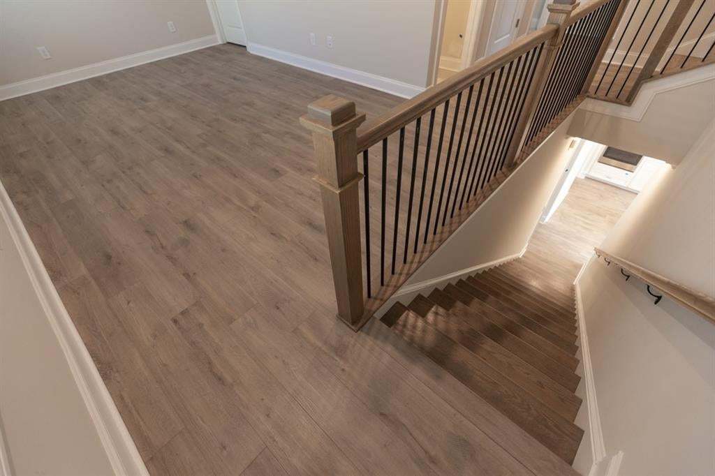 The Hampton second floor will host 3 additional bedrooms.  Perfect for family, friends, home office, whatever you need!  Photo is for representation purposes only, not of actual home but a previously built home by The Providence group.