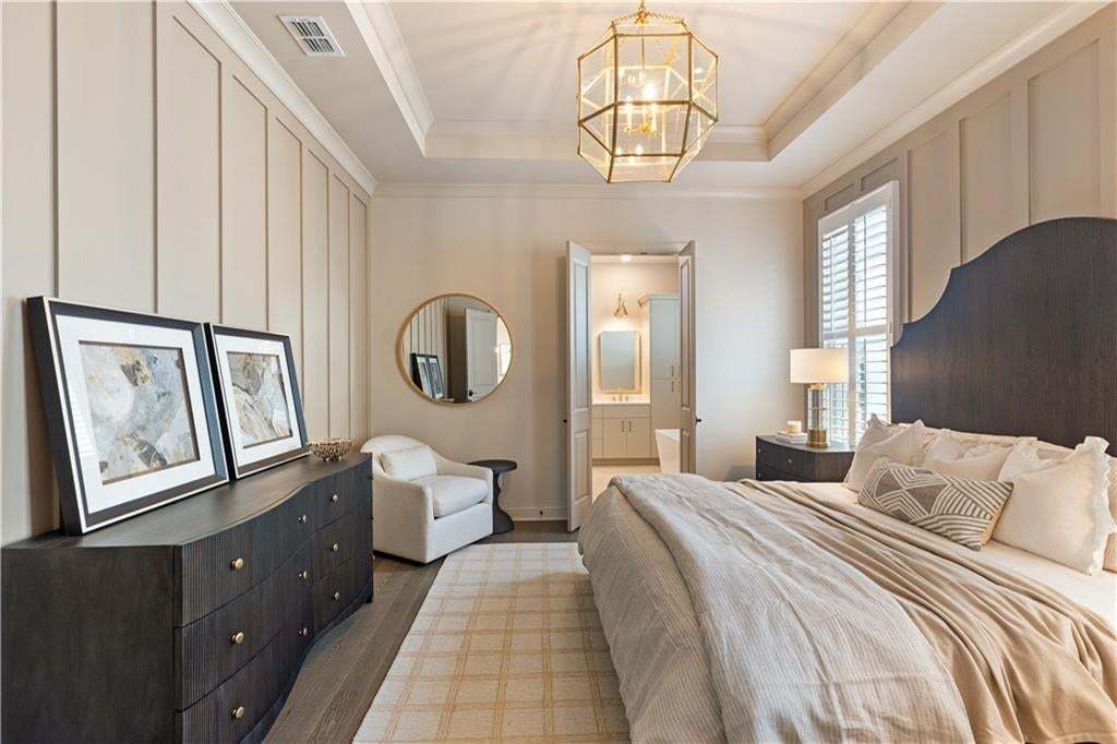 The primary bedroom in the Langston plan is spacious and open. Photo not of actual home but for representation purposes only.