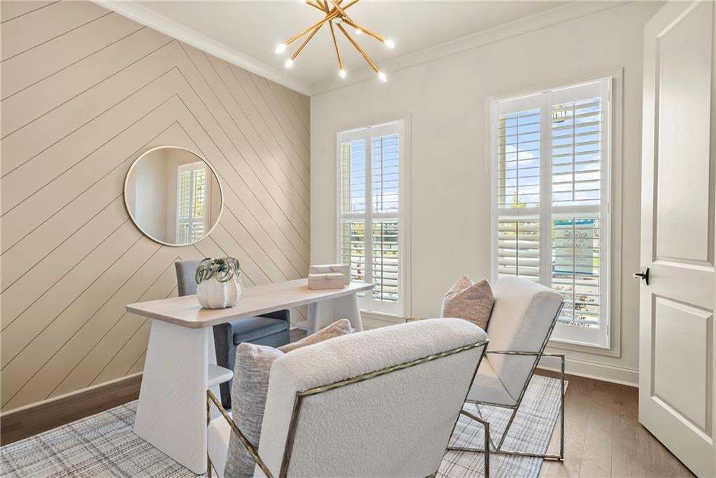 Beautiful front room. Perfect for home office or secondary guest room. Photo not of actual home but for representation purposes only.
