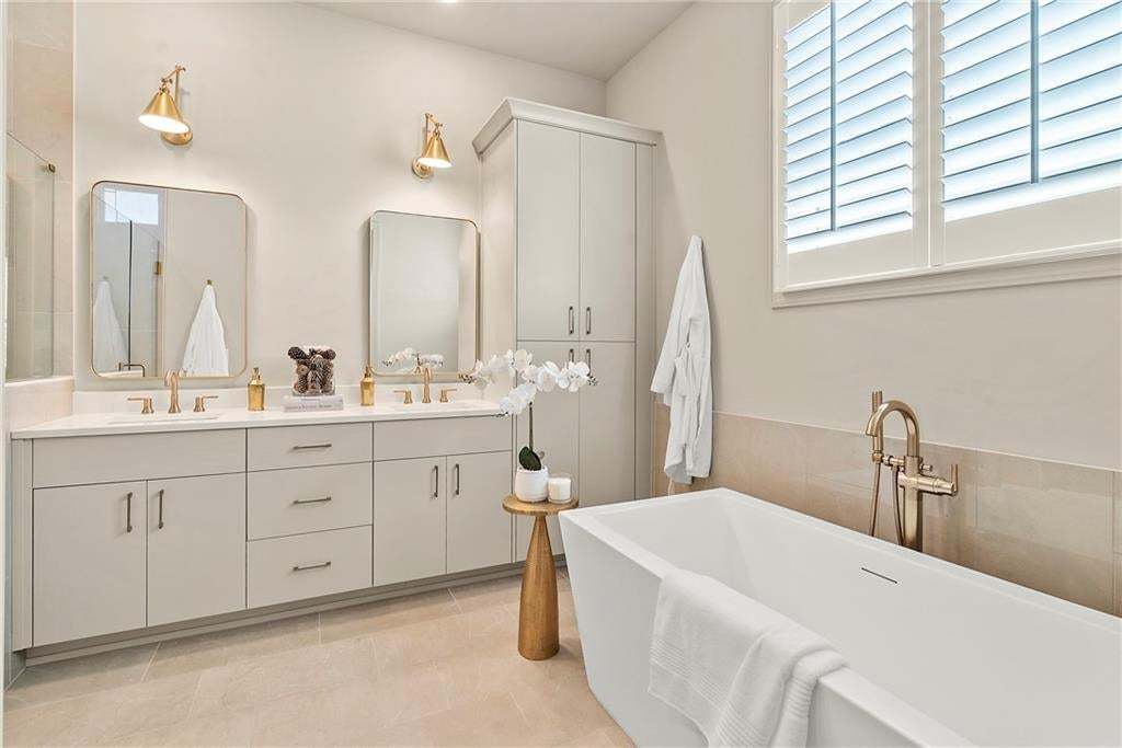 This primary bathroom is simply stunning! Photo not of actual home but for representation purposes only.