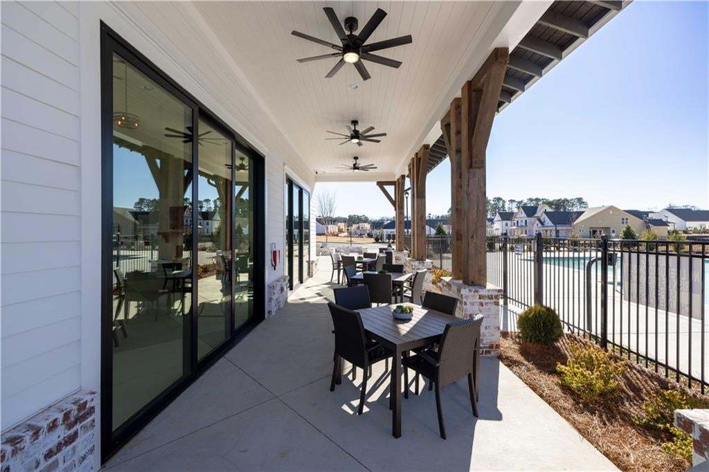Wonderful outdoor space near the pool for enjoying friends and family. Photo not of actual clubhouse, for representation purposes only.