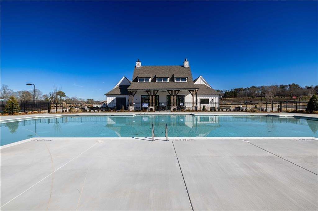 Community pool, great place to relax, socialize and enjoy your new neighborhood!! Photo not of actual clubhouse, for representation purposes only.