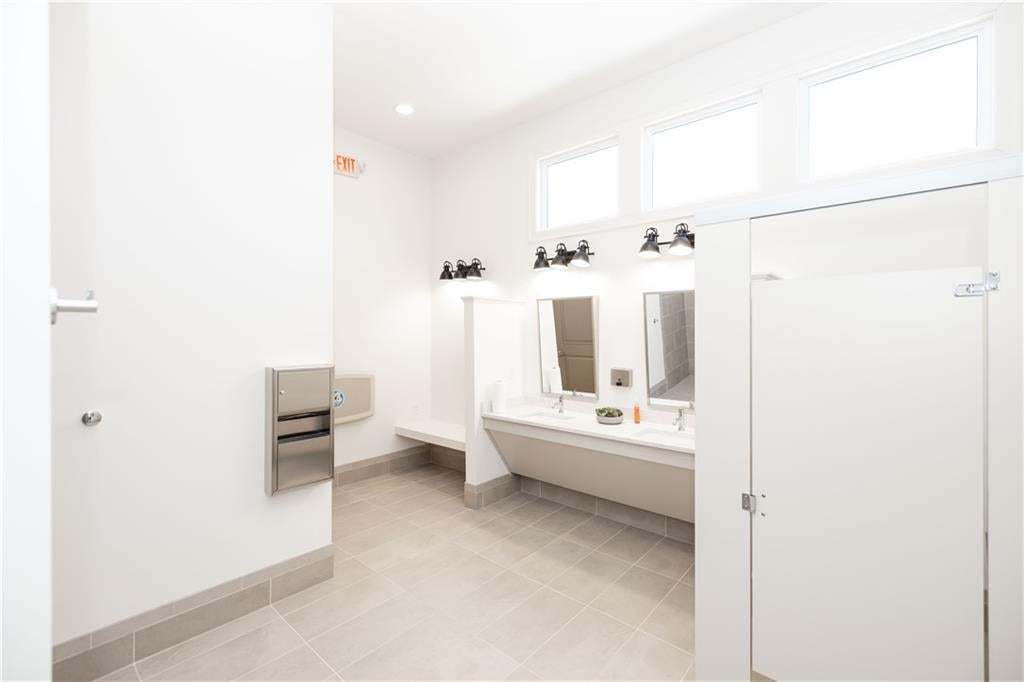 Women and mens locker rooms for after that workout in the fitness gym or cooling off after the pool! Photo not of actual clubhouse, for representation purposes only.