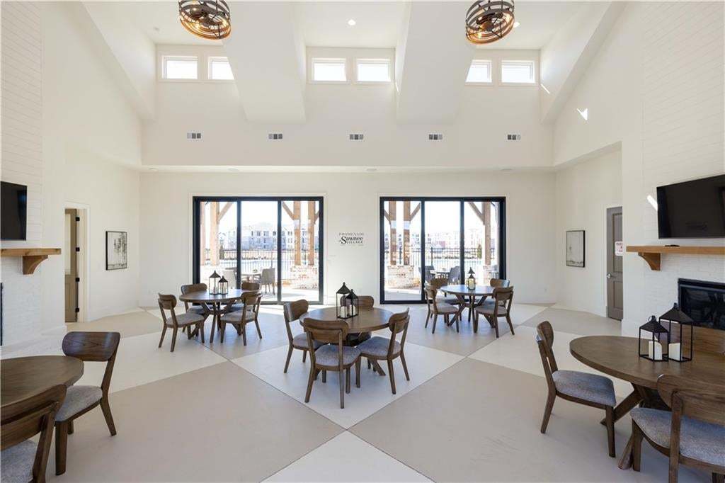 The meeting room in the clubhouse is a great spot for playing cards with neighbors, meetings, festivities!! Photo not of actual clubhouse, for representation purposes only.