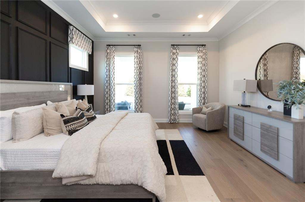 Everything about this home is amazing...come see for yourself! Photo not of actual home but a previously built TPG home of same plan.