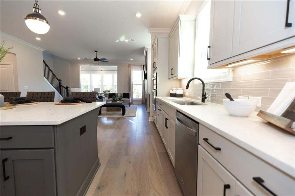 So much counterspace and cabinet storage in this stunning home.  Easy entertaining in this home!! Photo not of actual home but of a previously built Madilyn by TPG.