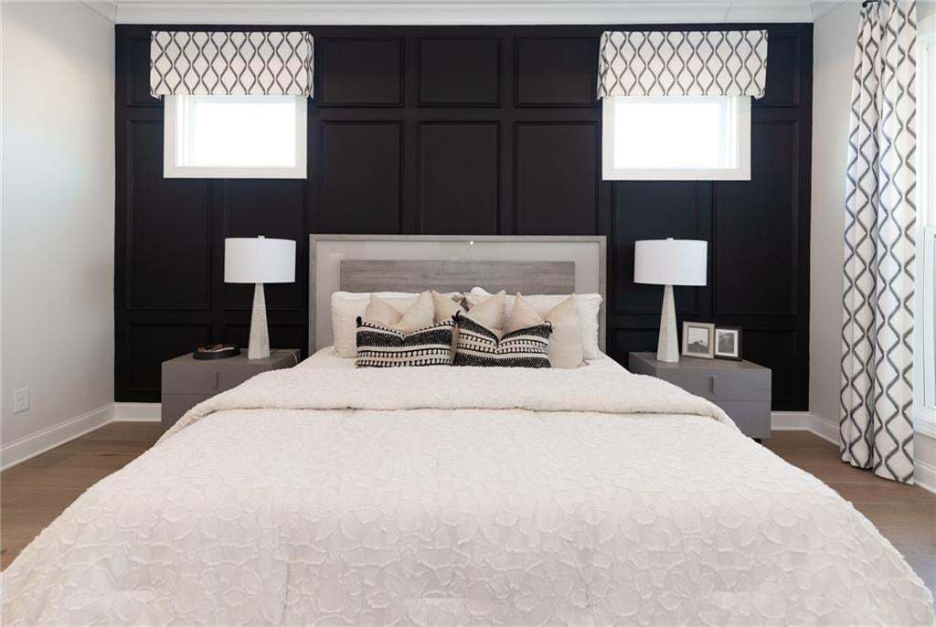 Primary bedroom is large and located on the main floor!  Photo not of actual home but a previously built Madilyn by The Providence Group.