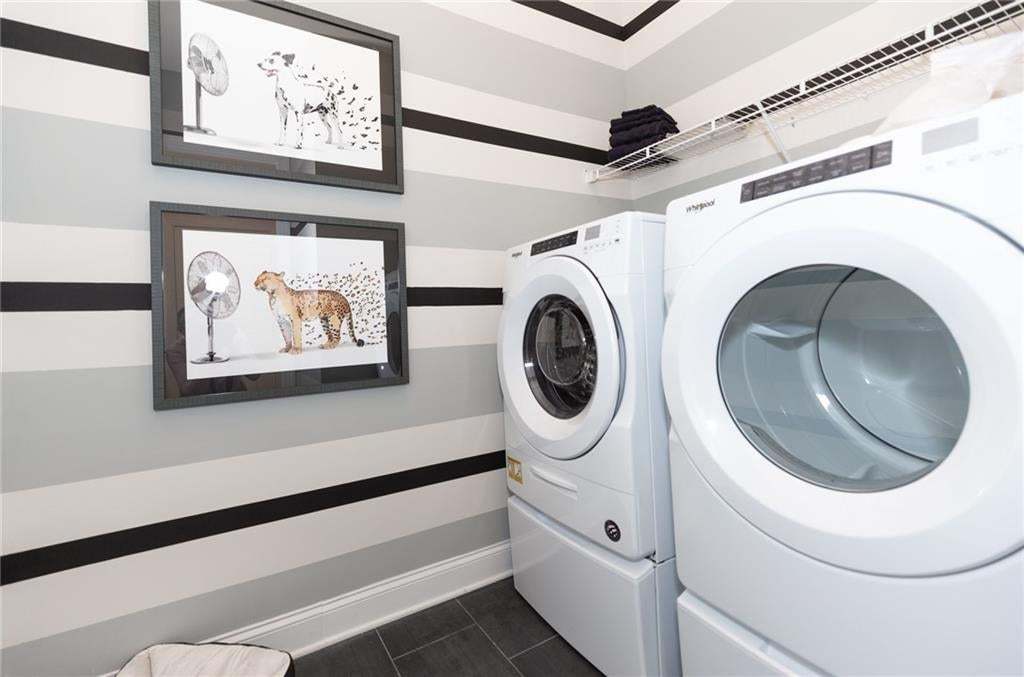 The spacious laundry room located on main floor.  Photo not of actual home but a previously built Madilyn by The Providence Group.