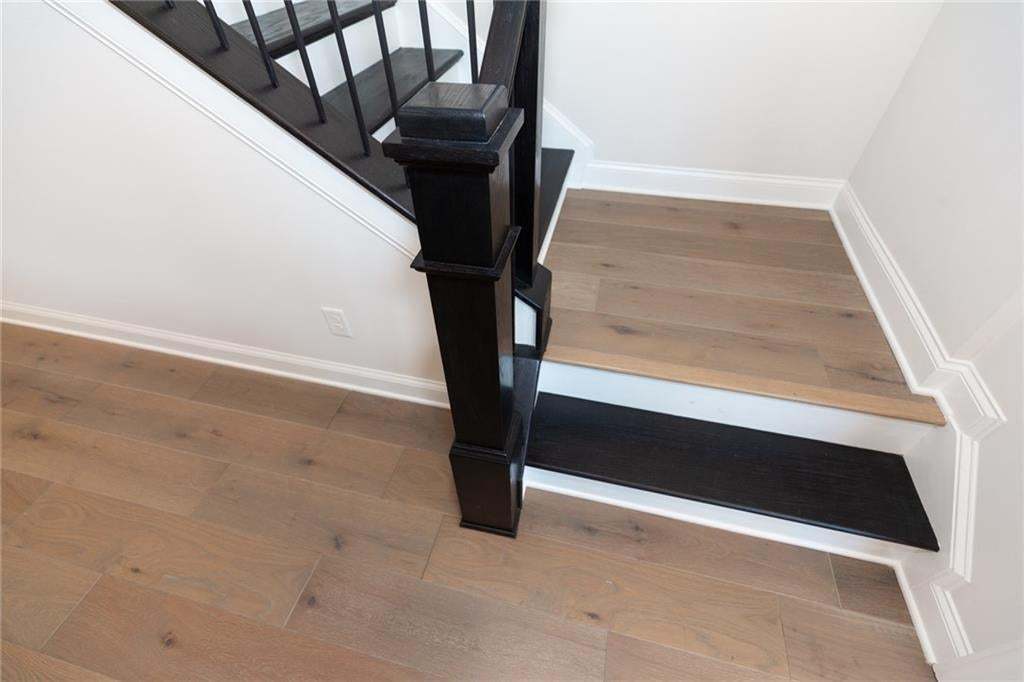 Gorgeous flooring throughout the home.  Photo not of actual home but a previously built Madilyn by The Providence Group.
