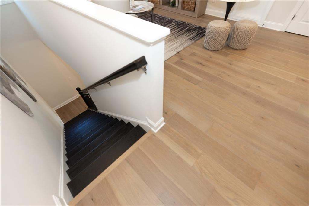 Great upstairs landing and secondary bedrooms will finish off this home!  Photo not of actual home but a previously built Madilyn by The Providence Group.