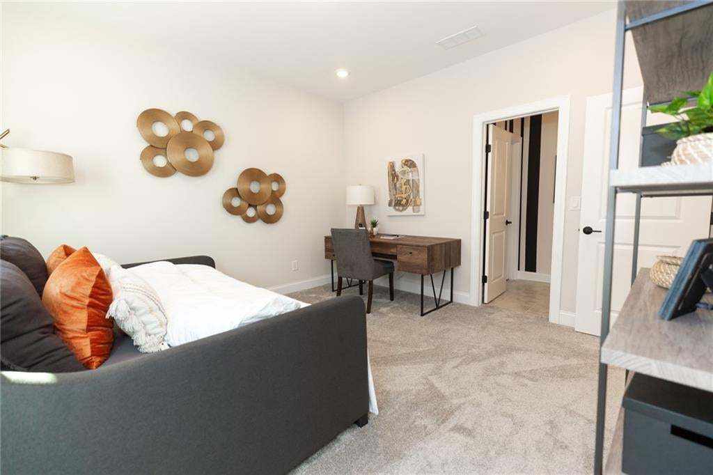 Great space that could have multi uses...home office, guest room, kids room, etc.  Photo not of actual home but a previously built Madilyn by The Providence Group.