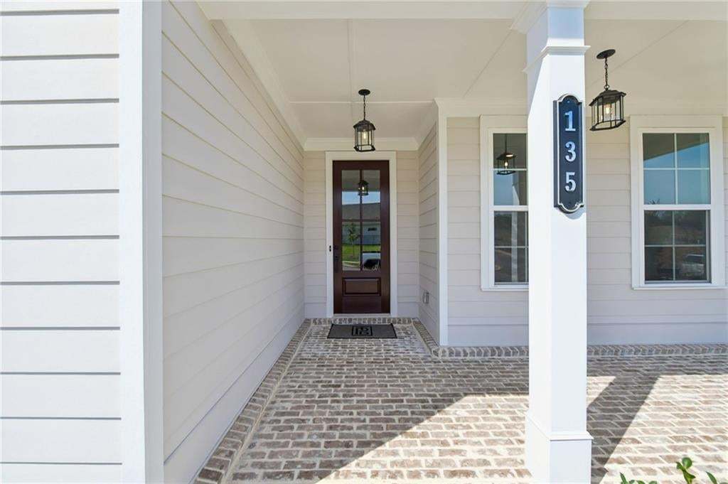 Front door entry has a welcoming porch. Come see us at Aberdeen. Photo not of actual home but a previously built TPG home.