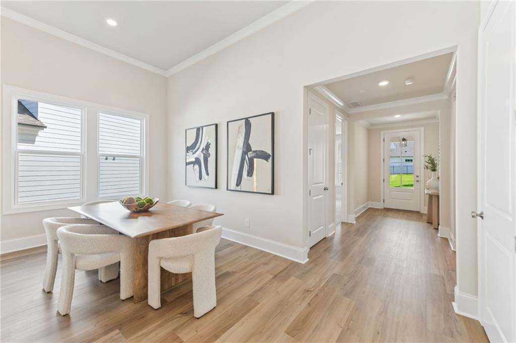 Come and pick your interior finishes: flooring, lighting, countertops, and all design elements. Photo not of actual home but a previously built TPG home.