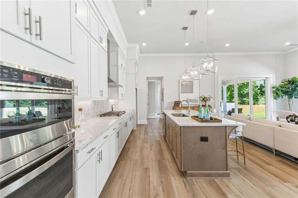 3 bedrooms on main floor, for true ranch living. Photo not of actual home but a previously built TPG home.