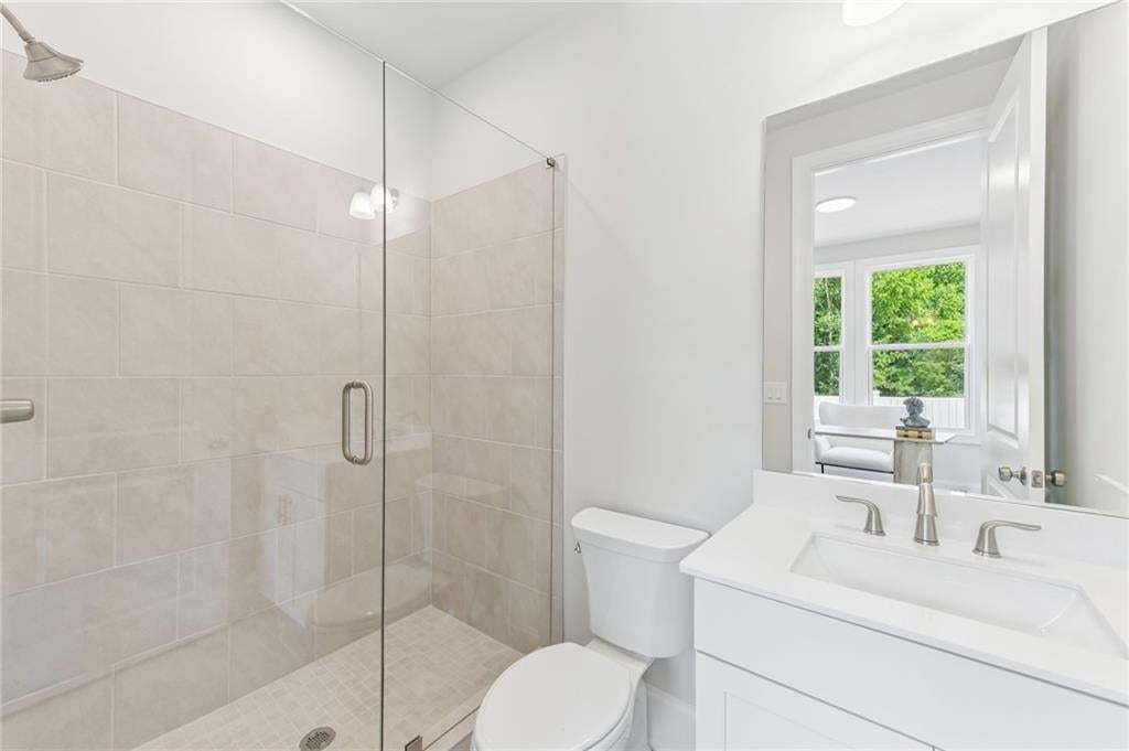 Third bathroom in this Braydon plan. This home is under construction and to be completed in Jan/Feb of 2027.Photo not of actual home but a previously built TPG home.
