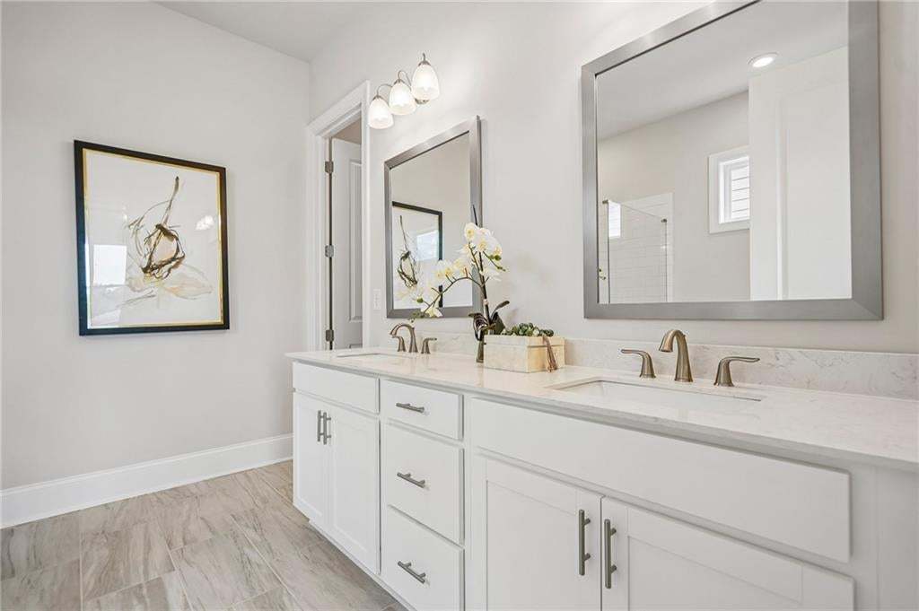 Dual sinks with cabinets and drawers- yes and yes!