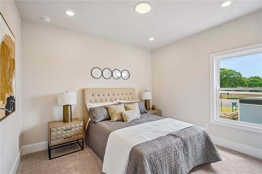 second guest bedroom upstairs witha walk in closet