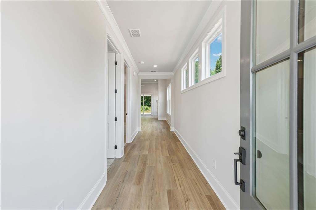 Open the door to your new home. Walk in to an inviting foyer