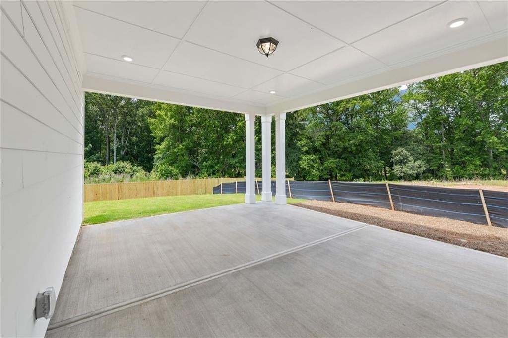Welcome to the covered patio- Eat here, relax here, cook here or watch your favorite show!