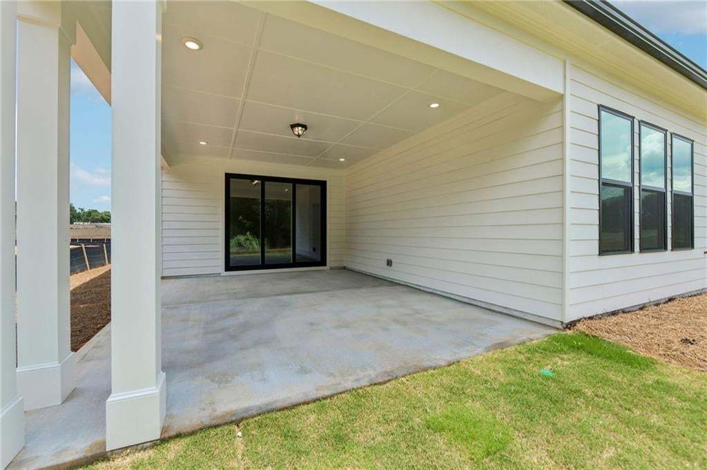 Covered patio, easily could screen in if you awnted to do so.