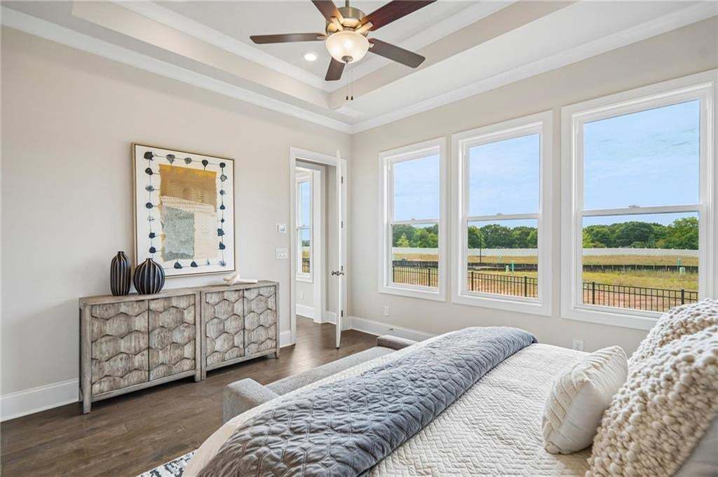 Love all the windows in the primary bedroom. Customize the flooring, lighting and make this home feel like it is perfect for you...because it is! Not of actual house but for representation purposes, previously built TPG home.