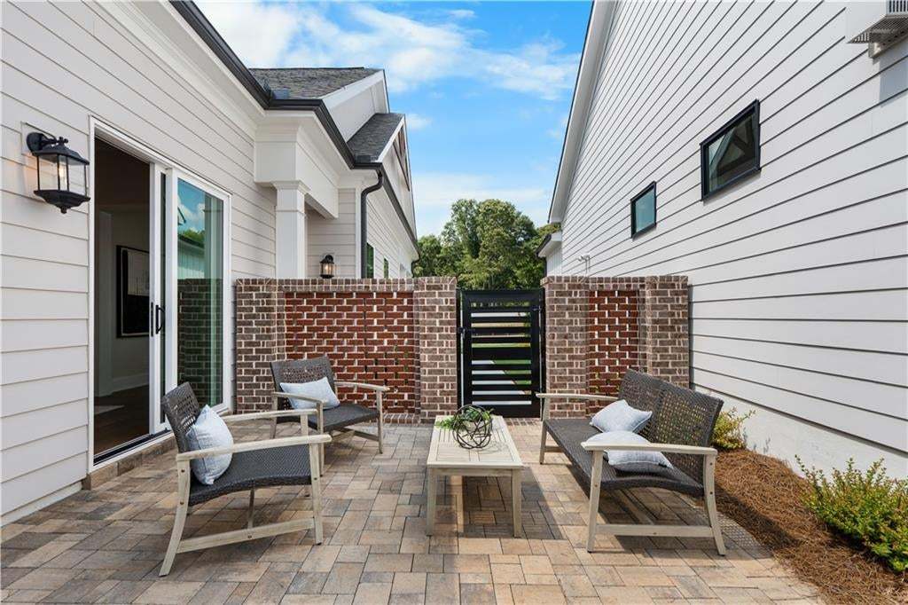 The outdoor area on this home will make you want to enjoy all of GA's seasons!! Photo not of actual home but a similar TPG previously built home.