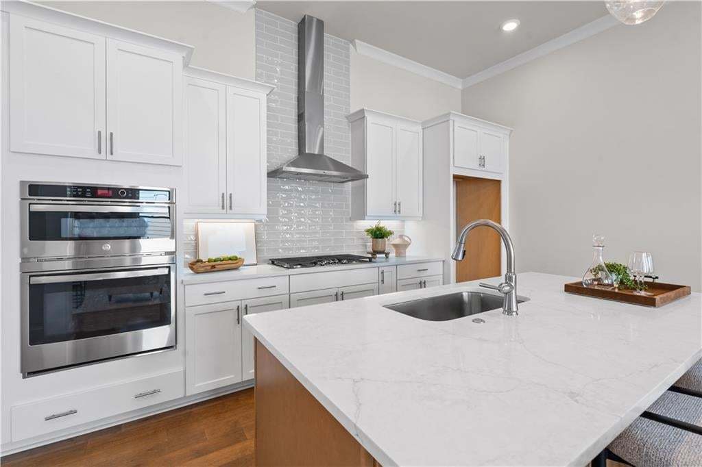Select your own finishes: quartz countertops, cabinets, lighting, plumbing fixtures, floors...just to name a few. Photo not of actual home but a similar TPG previously built home.