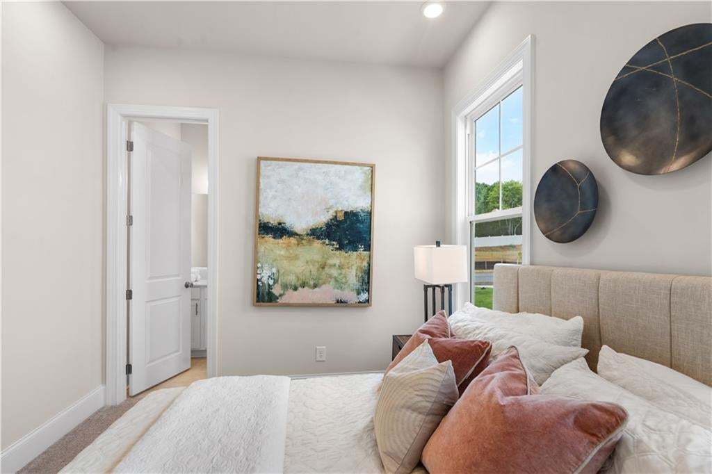 The Lily ranch style home. 2 bedrooms each with an ensuite all located on main floor. Photo not of actual home but a similar TPG previously built home.