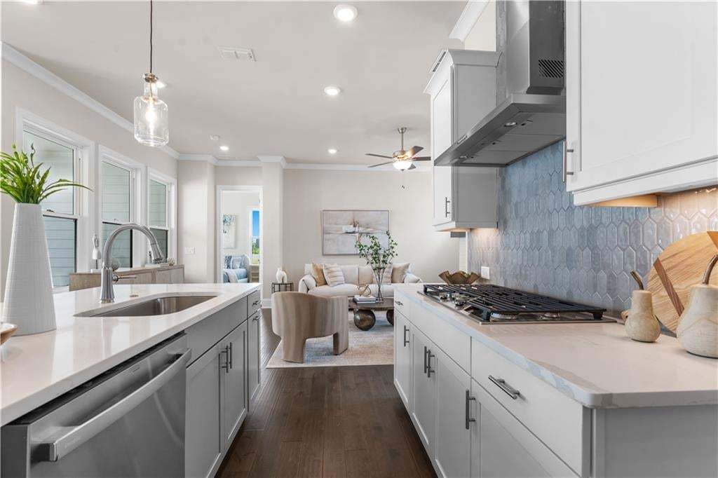 Pick out your favorite flooring, lighting, tile, backsplash and countertops to personalize this home to your taste! Photo not of actual home but a similar TPG previously built home.
