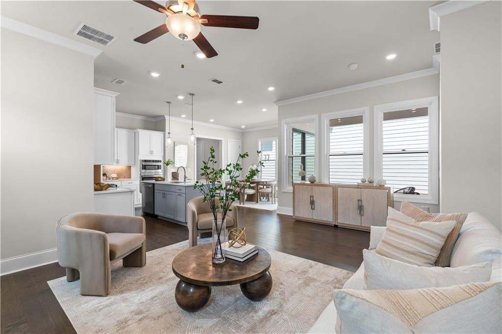 Open concept home with 10 foot ceilings on main floor, 8 foot solid doors and windows to let that good natural light in! Photo not of actual home but a similar TPG previously built home.