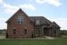 casa en Tim Tomlinson Homes Inc. por Tim Tomlinson Homes Inc.