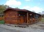 casa en Timeless Timbers, Inc. por Timeless Timbers, Inc.