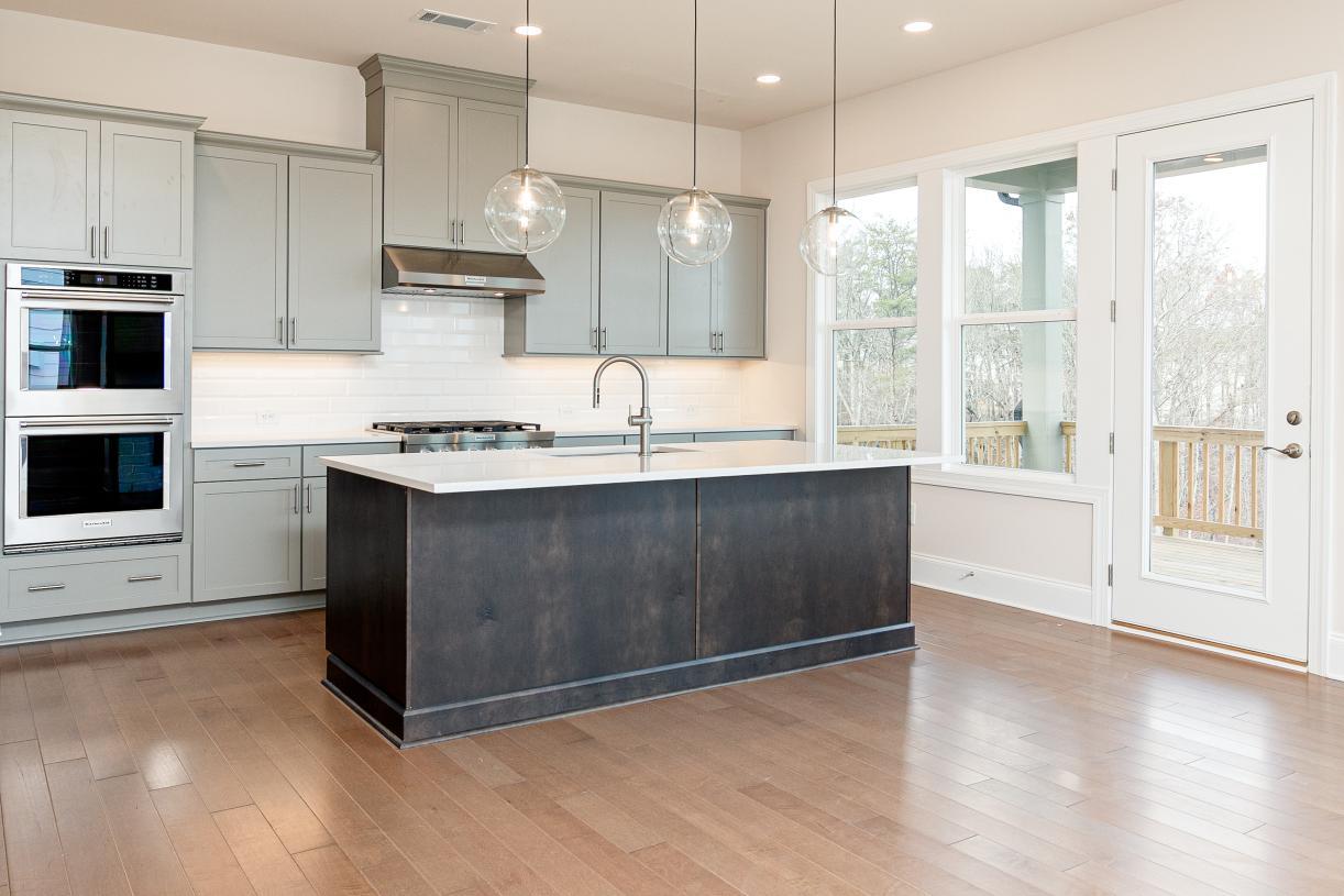 Chef-style kitchen that flows seamlessly to outdoor living space