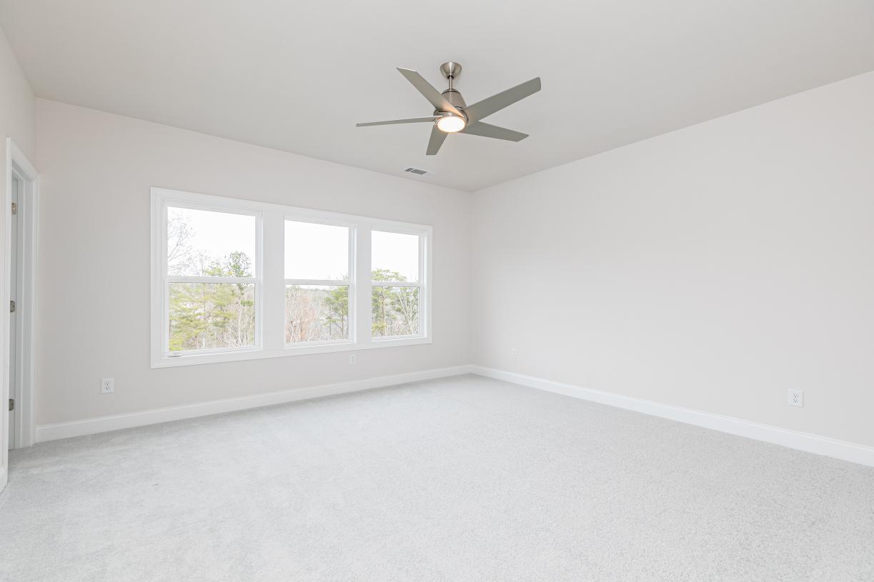 Expansive primary bedroom suite