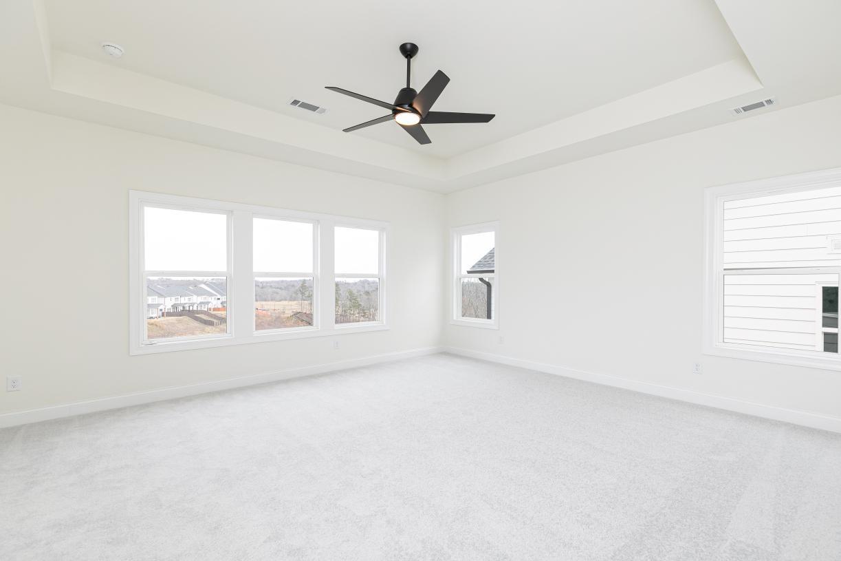 Expansive primary bedroom suite
