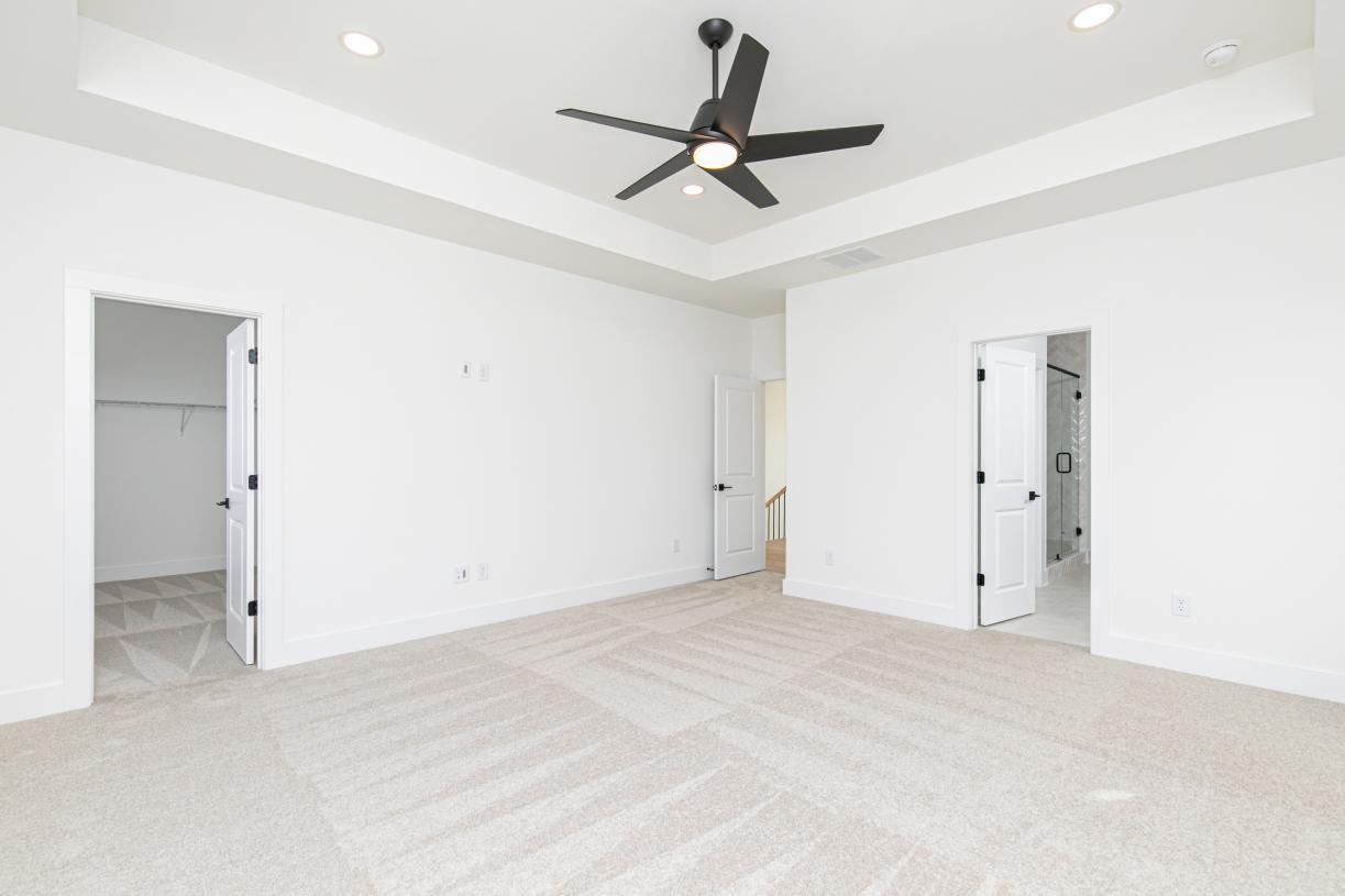 Spacious primary bedroom suite